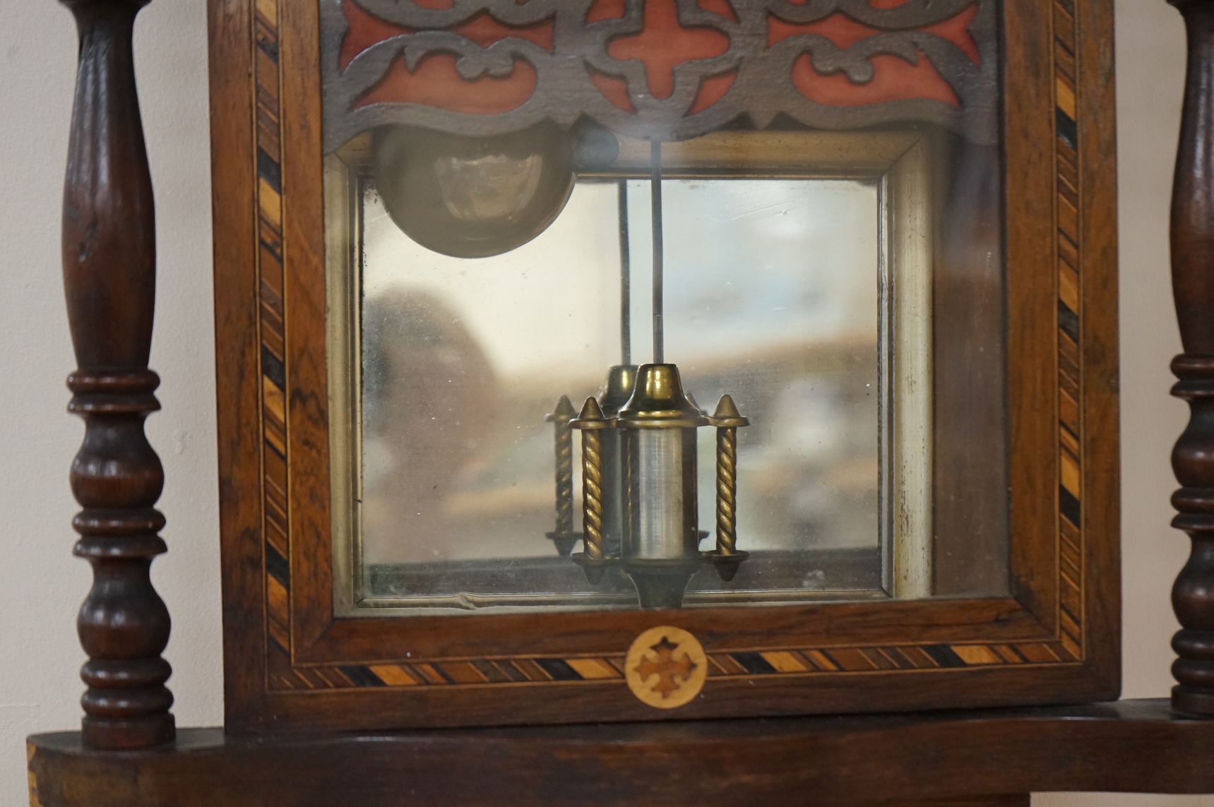 A German inlaid walnut wall clock, 84cm high, with pendulum.